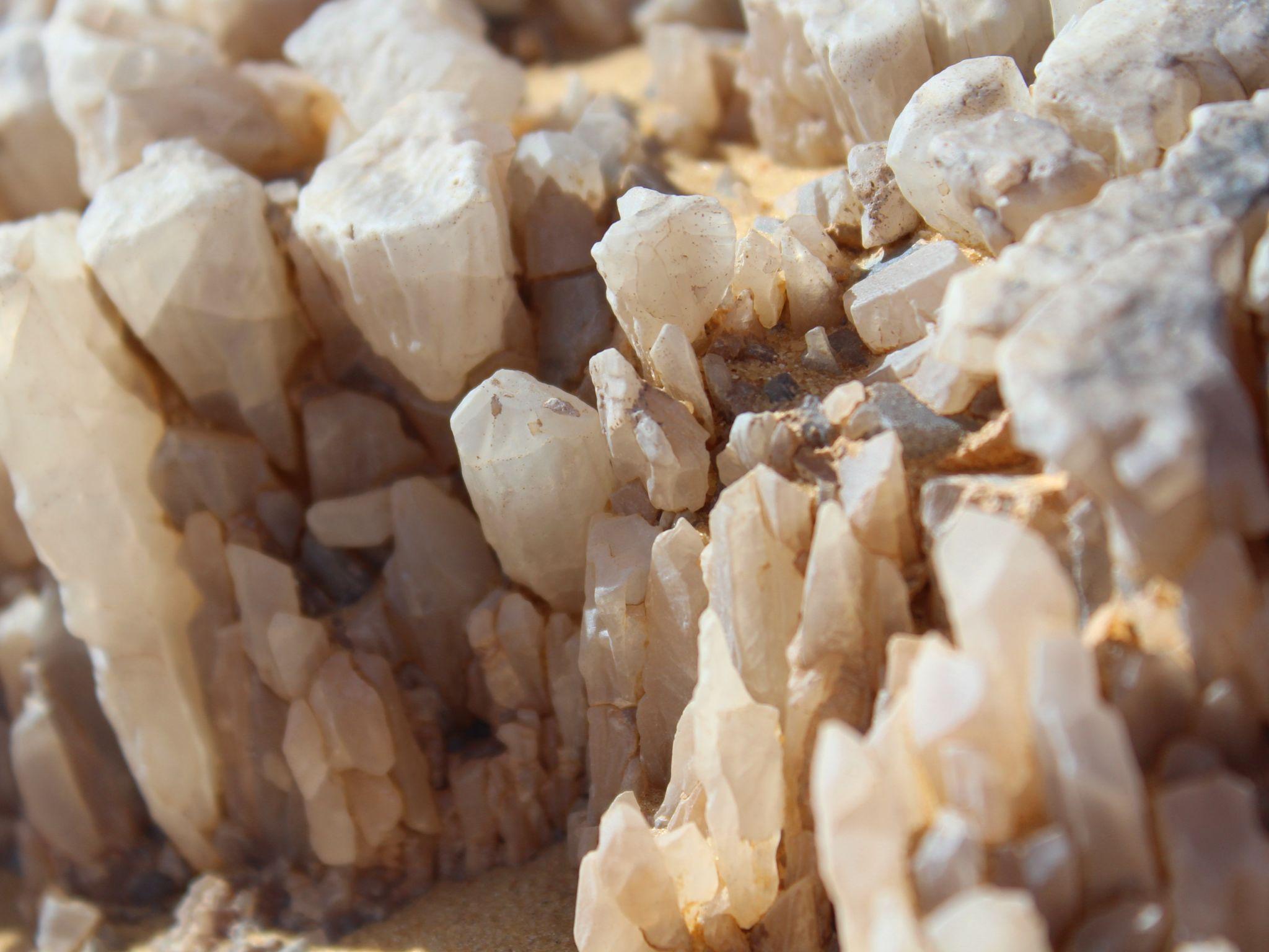 Close-up of jagged white crystalline rock formations in the Bahariya desert landscape
