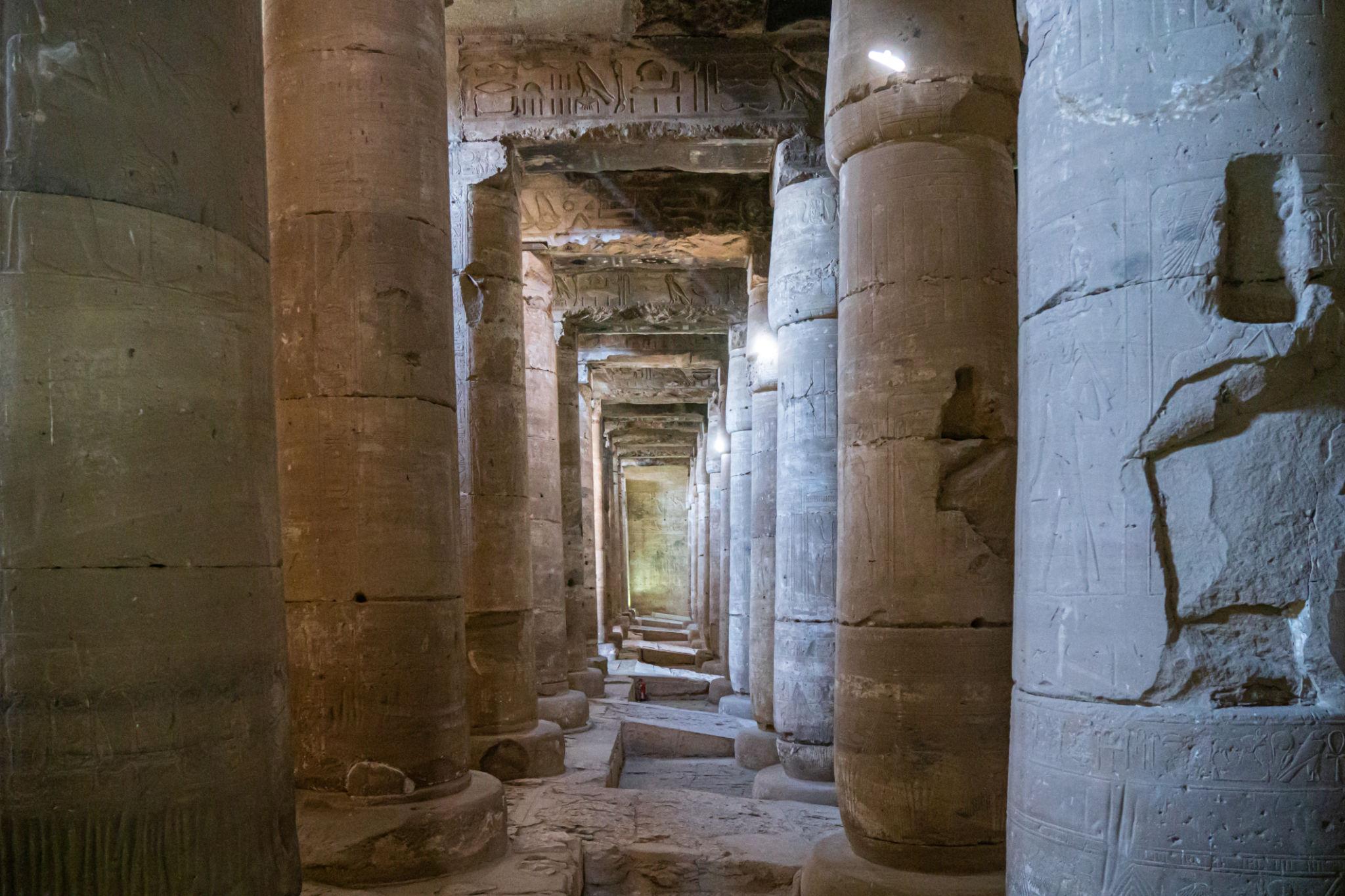 Massive carved columns of the hypostyle hall at the Temple of Seti I.