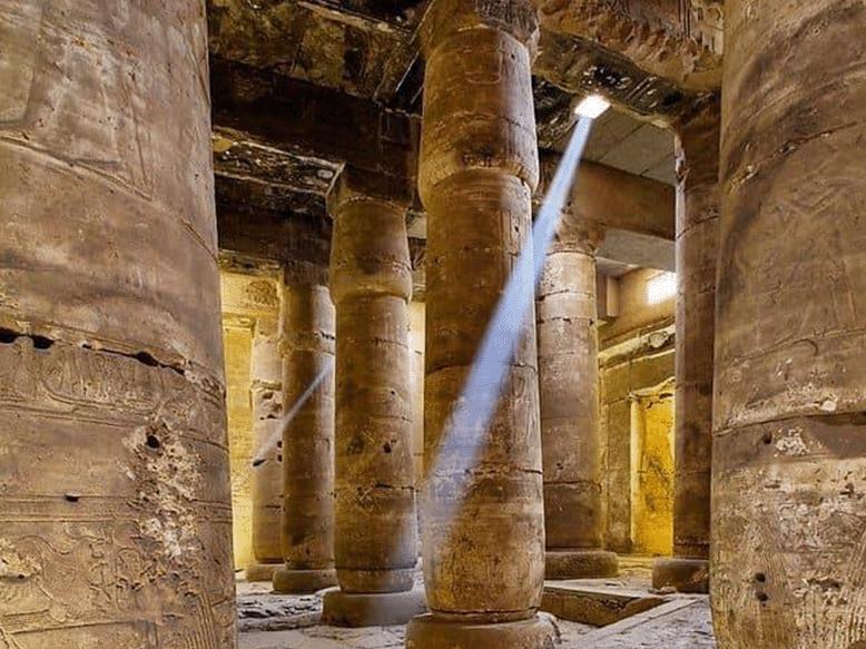 Sunbeam piercing the hypostyle hall of the Temple of Seti I at Abydos.