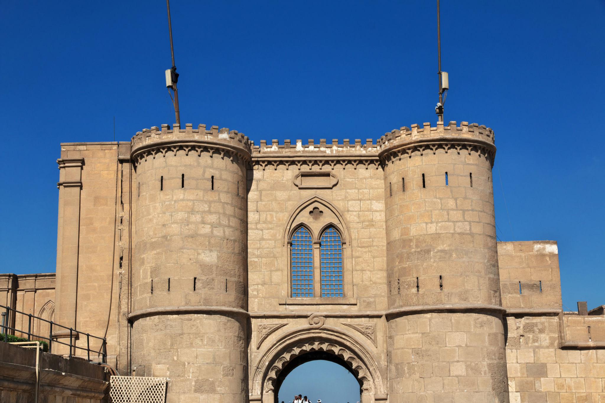 Twin stone towers and arched gate of the Citadel of Saladin fortress walls in Cairo