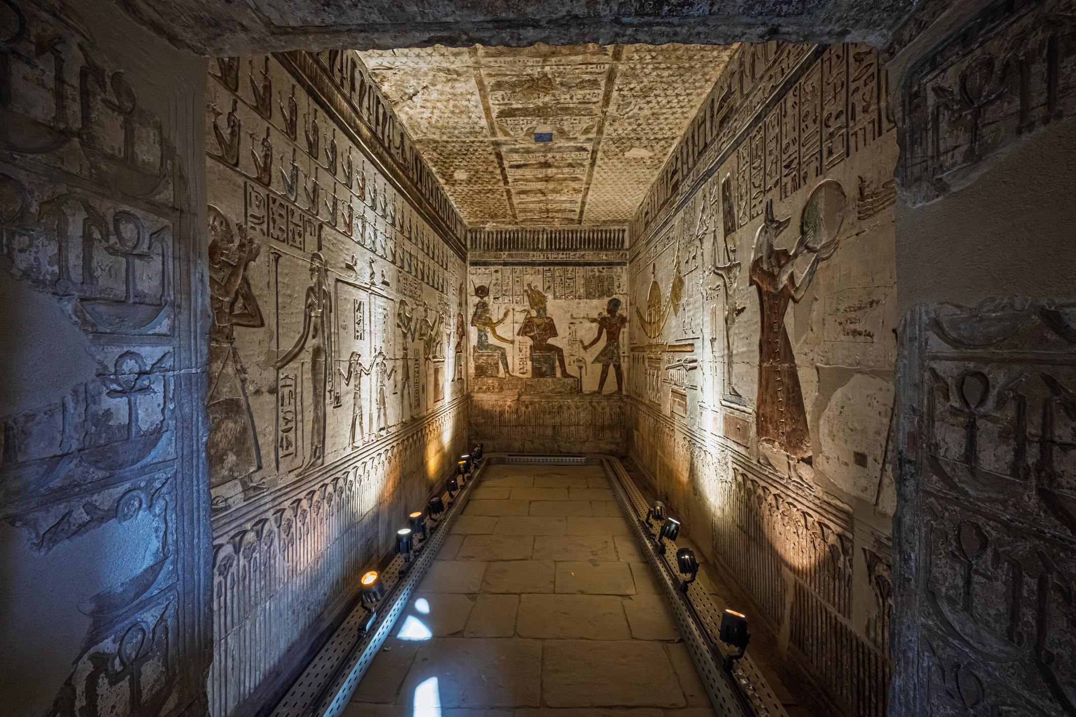 Interior sanctuary of the Hathor temple at Deir el-Medina with carved walls and painted ceiling