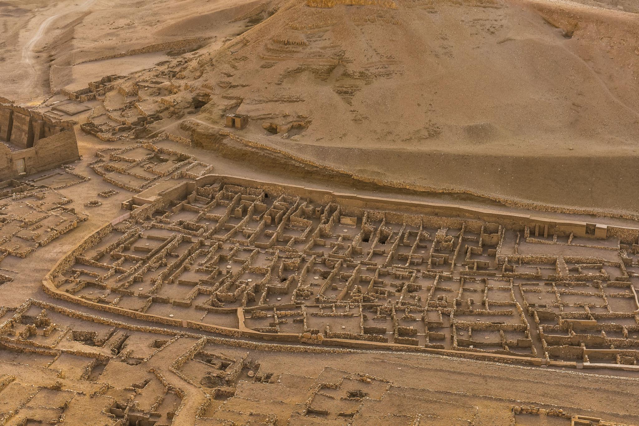 Aerial view of the grid of mudbrick house foundations forming the Deir el-Medina workers' village