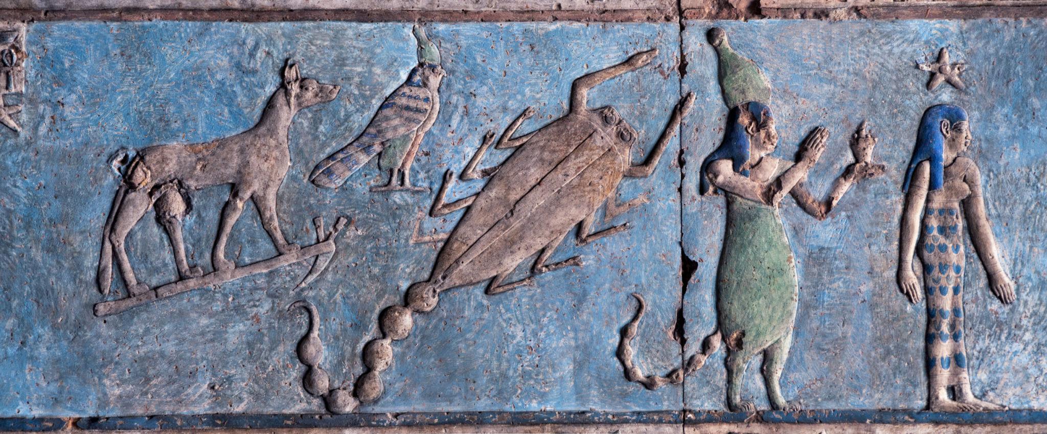 Blue-painted relief of constellation figures and animals on Dendera's astronomical ceiling.