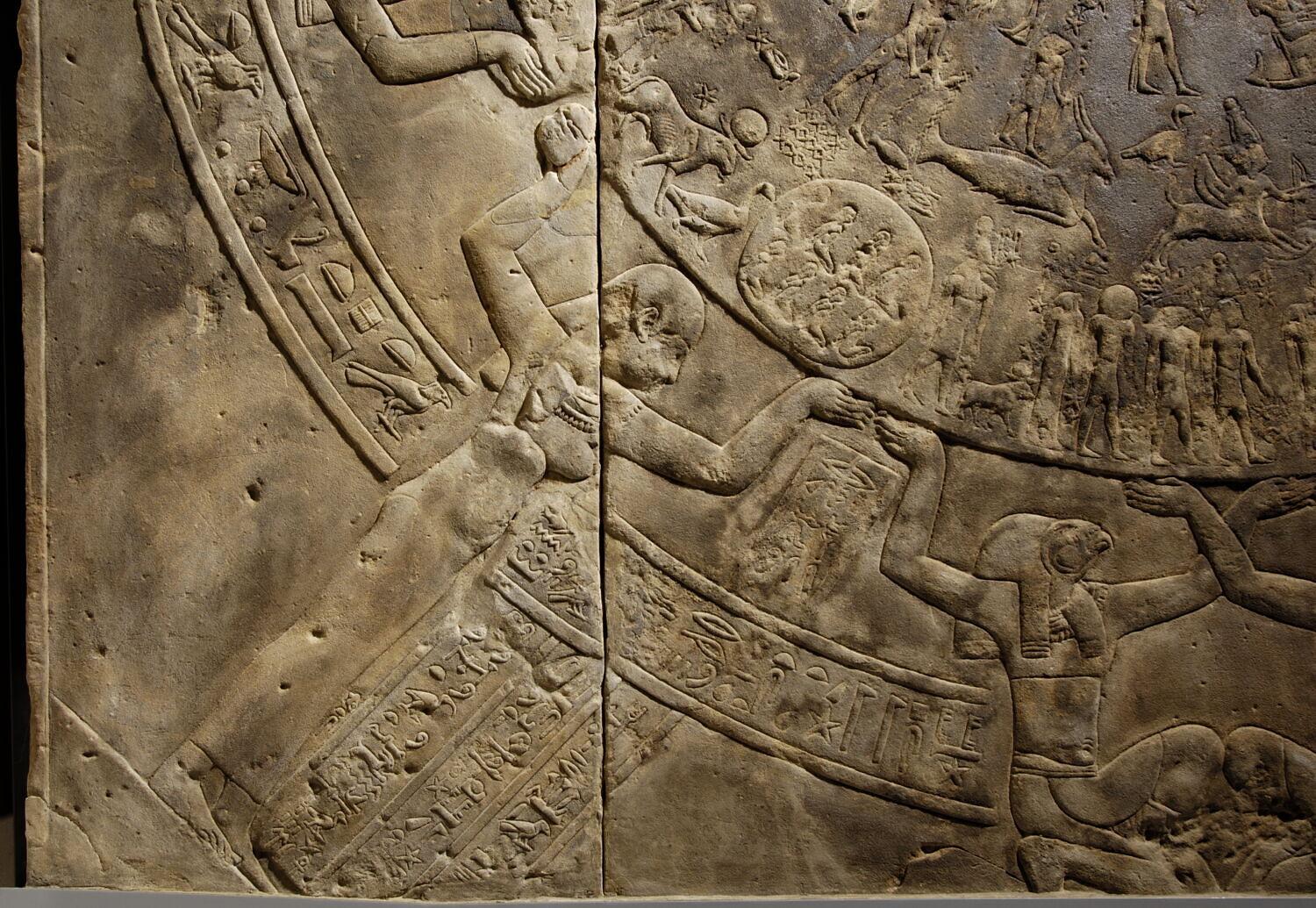 Detail of the Dendera Zodiac showing figures carrying the celestial disk.