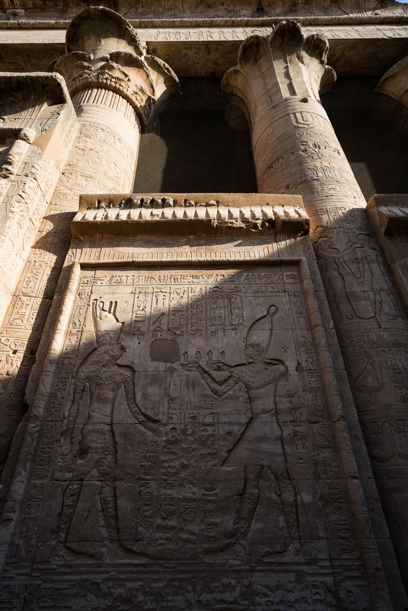Ritual relief scene between columns of the pronaos at the Temple of Edfu.