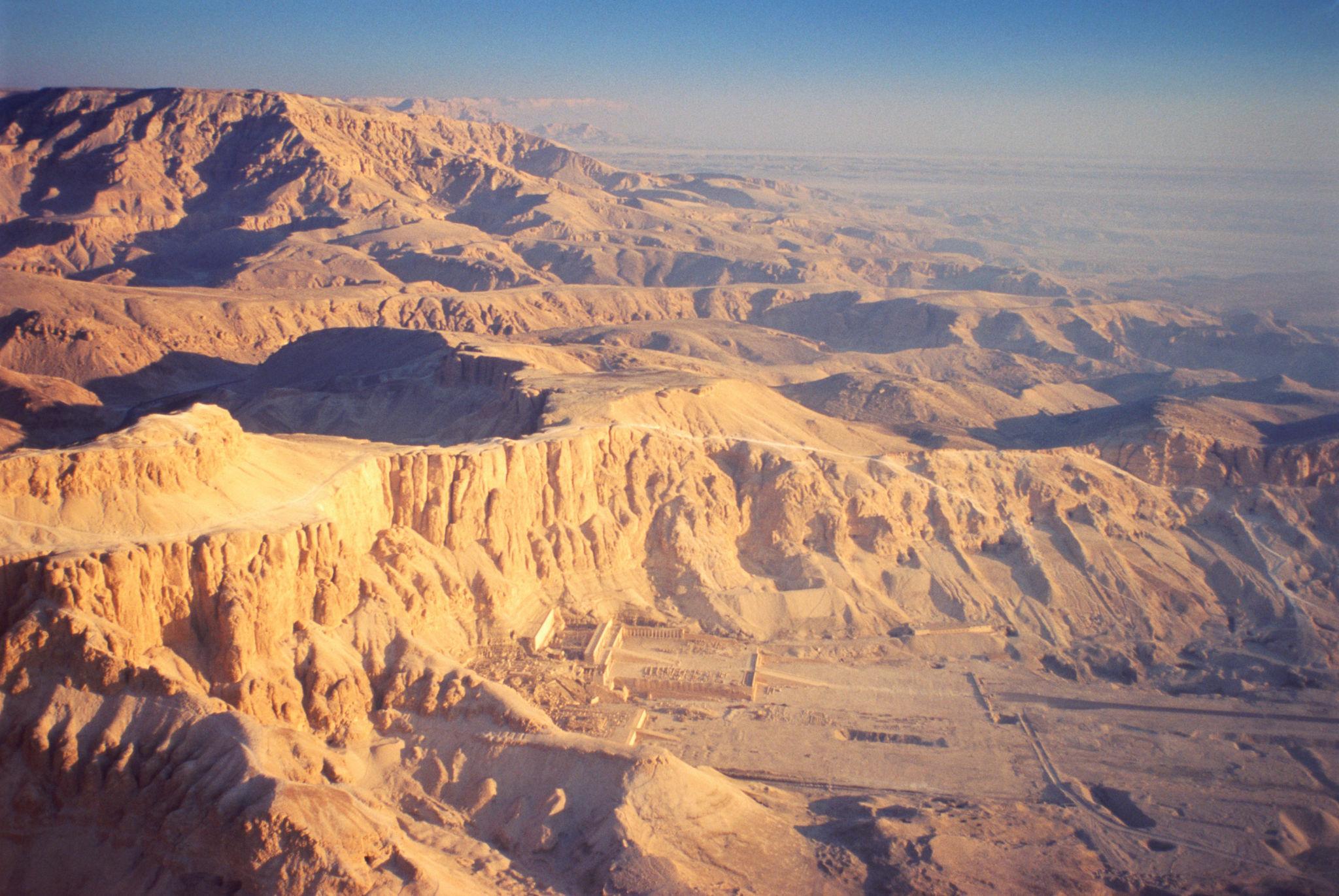 Aerial view of Hatshepsut Temple in the valley at sunrise over Theban hills