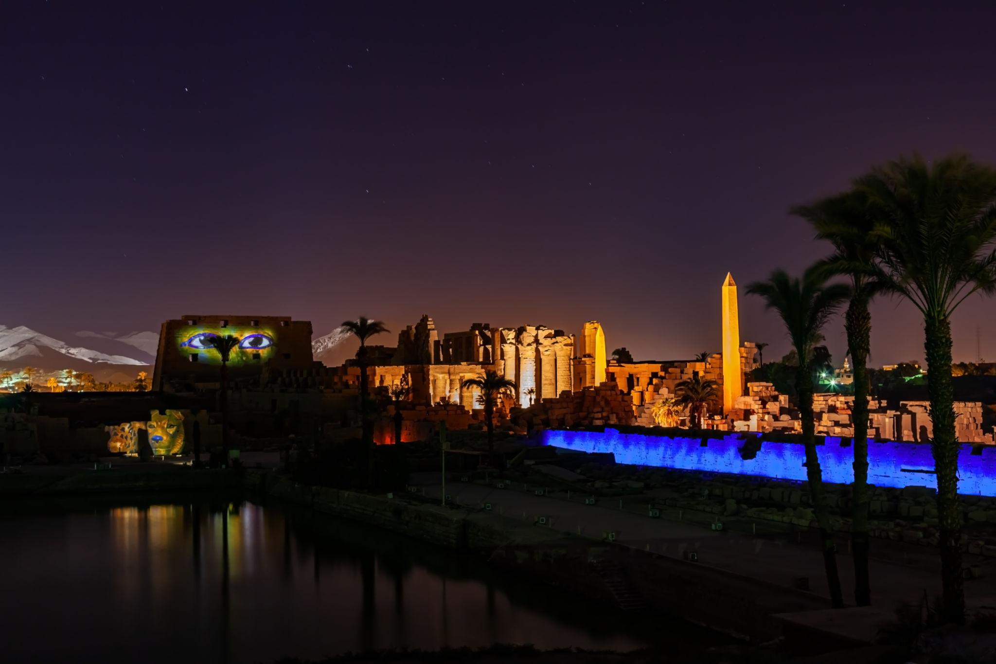 Karnak Temple illuminated at night during the sound and light show with obelisk