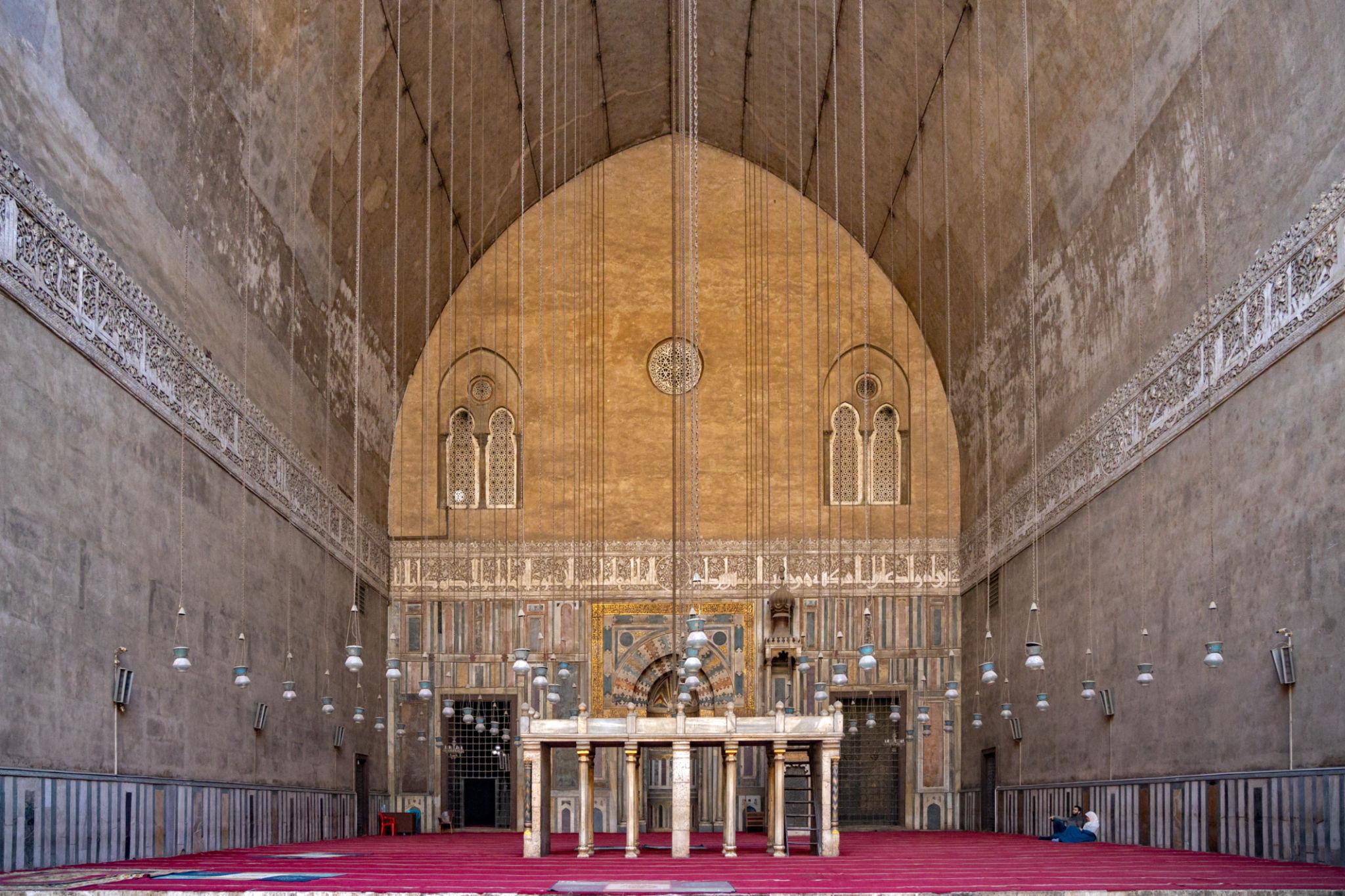 Great qibla iwan with mihrab and minbar beneath soaring pointed stone vault