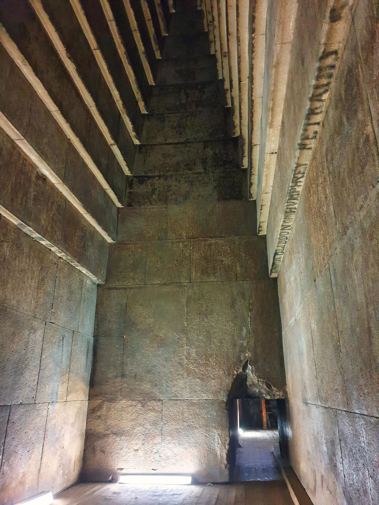 Looking up the tall corbelled stone walls inside the Red Pyramid's inner chamber
