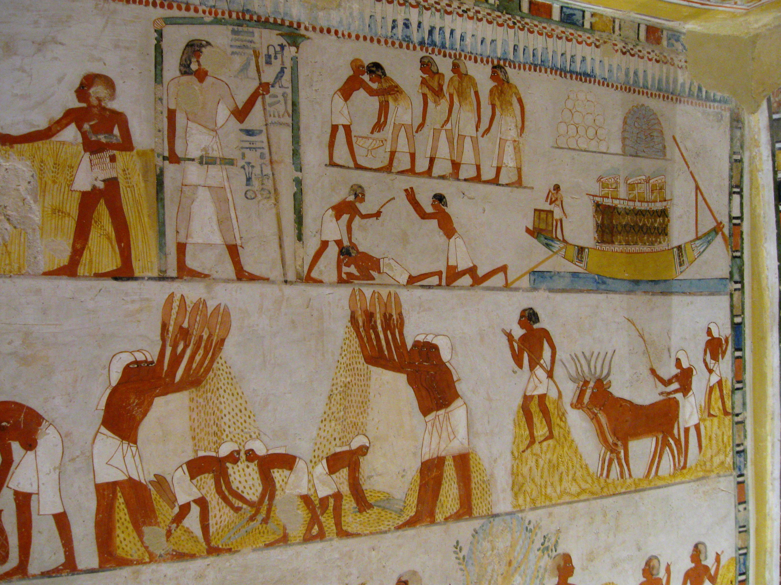 Painted harvest scene with farmers reaping grain and ploughing with cattle.